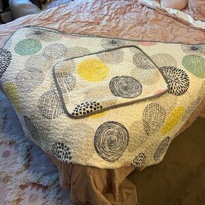 Reversible quilt with sham set for twin bed